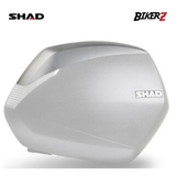 White motorcycle fuel tank cover with SHAD branding on a white background
