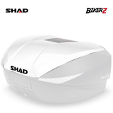 White motorcycle storage box with SHAD branding on a white background
