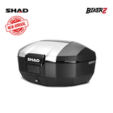 Black and silver motorcycle storage box with SHAD branding on a white background